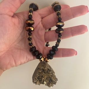 Women's Black and Golden Necklace.